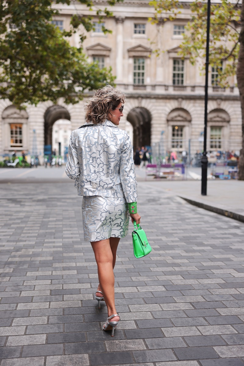 London Fashion Week Street Style 2024 by Think-Feel-Discover.com at Mayfair London, silver silk blazer.