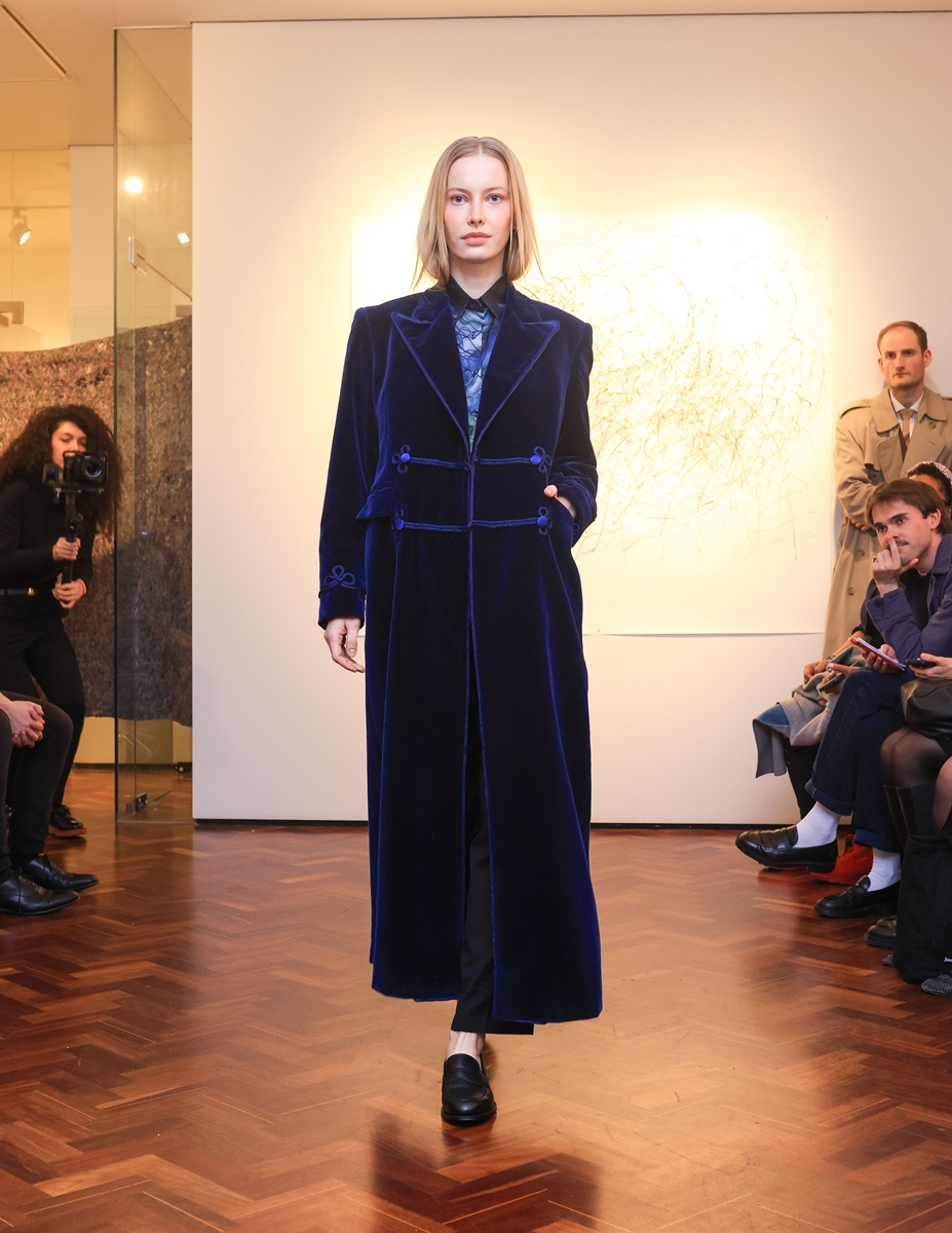 Blue Raven Velvet coat by Banshee of Savile Row at the London Fashion Week February 2025.