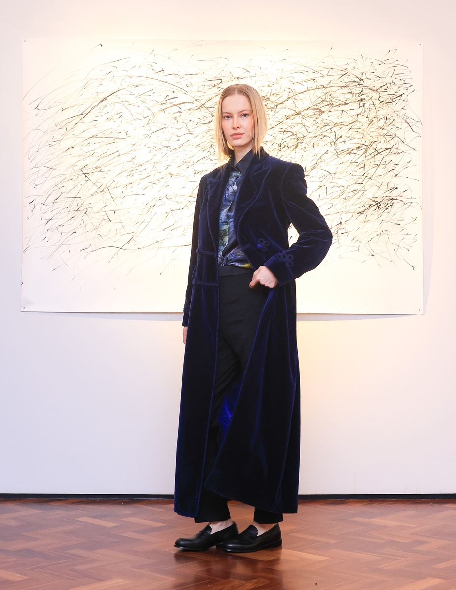Blue Raven Velvet coat by Banshee of Savile Row at the London Fashion Week February 2025.