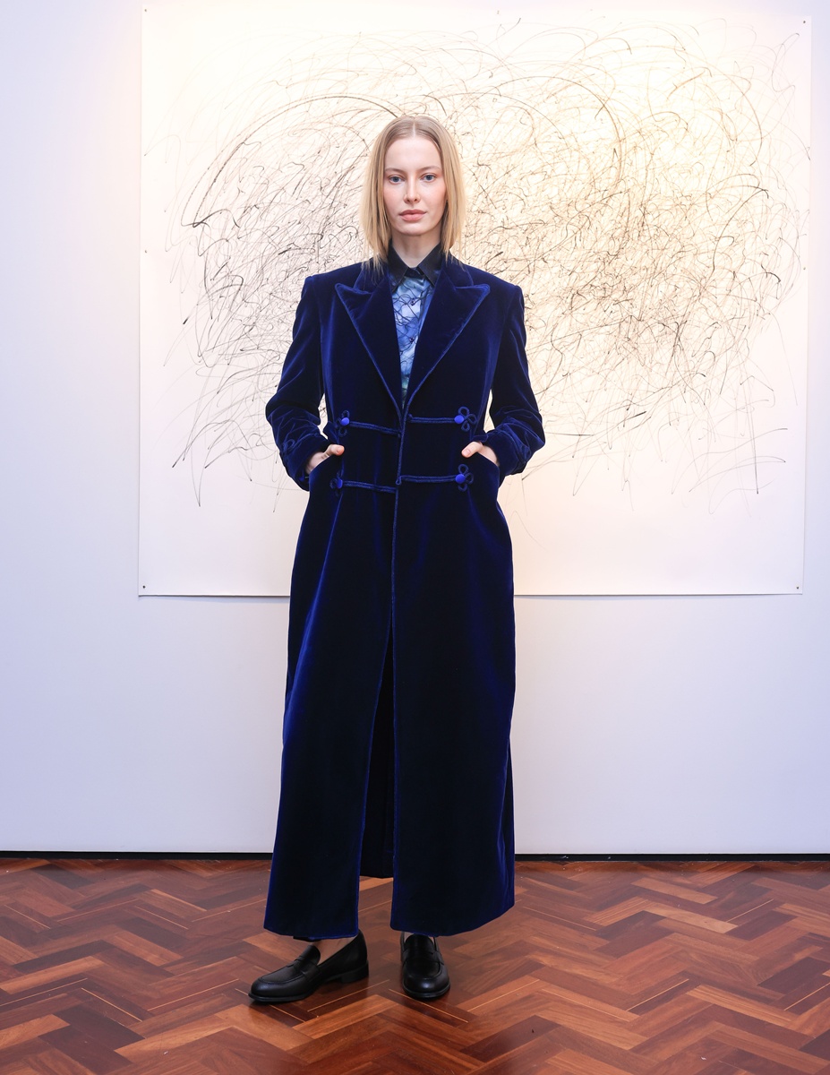 Blue Raven Velvet coat by Banshee of Savile Row at the London Fashion Week February 2025.