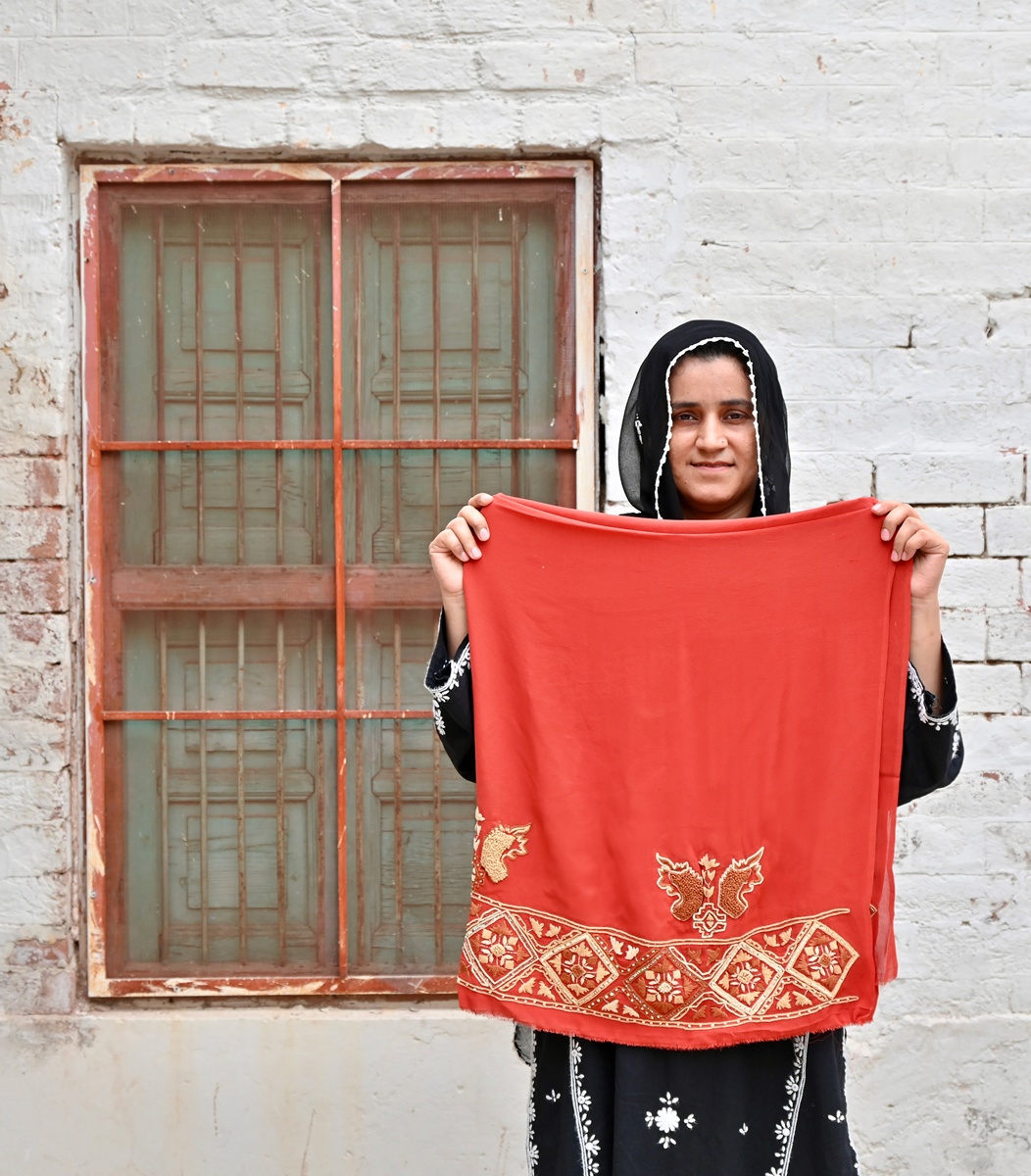 Embroidery by Hafsa Fisha Pakistan women artisan of Kaarvan Crafts Foundation for Omar's collection Meluhas.