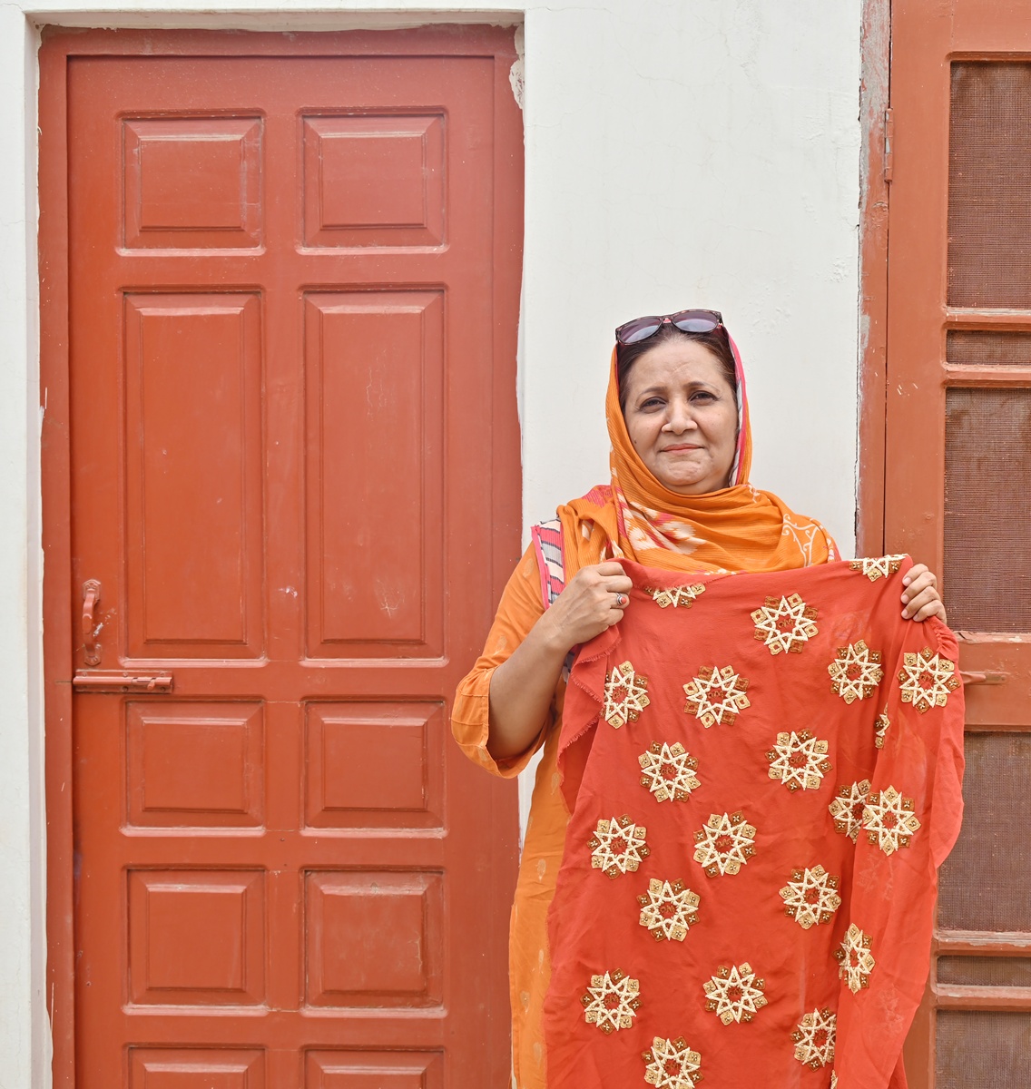 Embroidey by Nusrat Sultana Pakistan women artisan of Kaarvan Crafts Foundation for Omar's collection Meluhas.