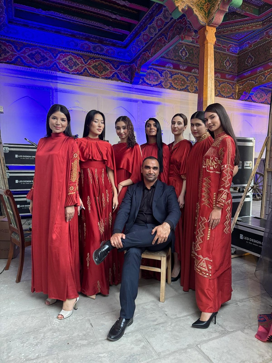 Omar mansoor with the models of his fashion show at Uzbekistan