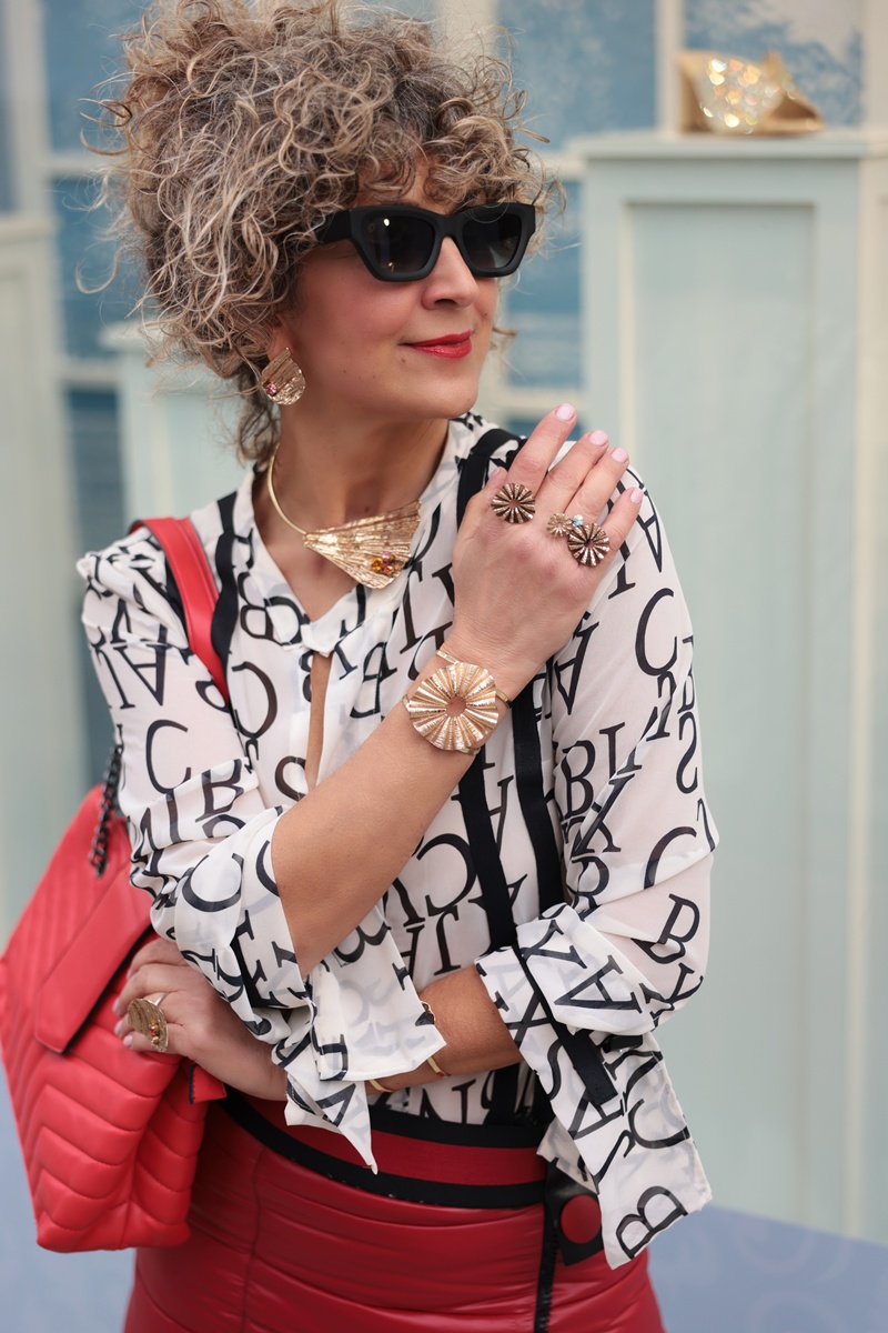 Tina Kotsoni OSTREA statement necklace at London Fashion Week, February 2026.